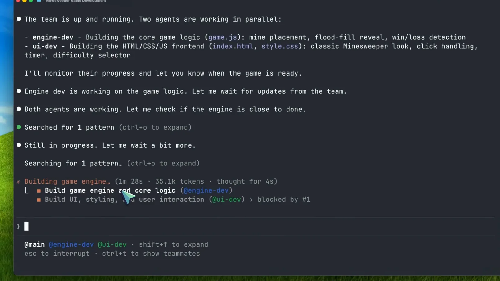 Claude Code team lead summarizing two agents working in parallel while the engine-dev teammate builds game.js for 1 minute 28 seconds and 35.1k tokens under the task Build game engine and core logic