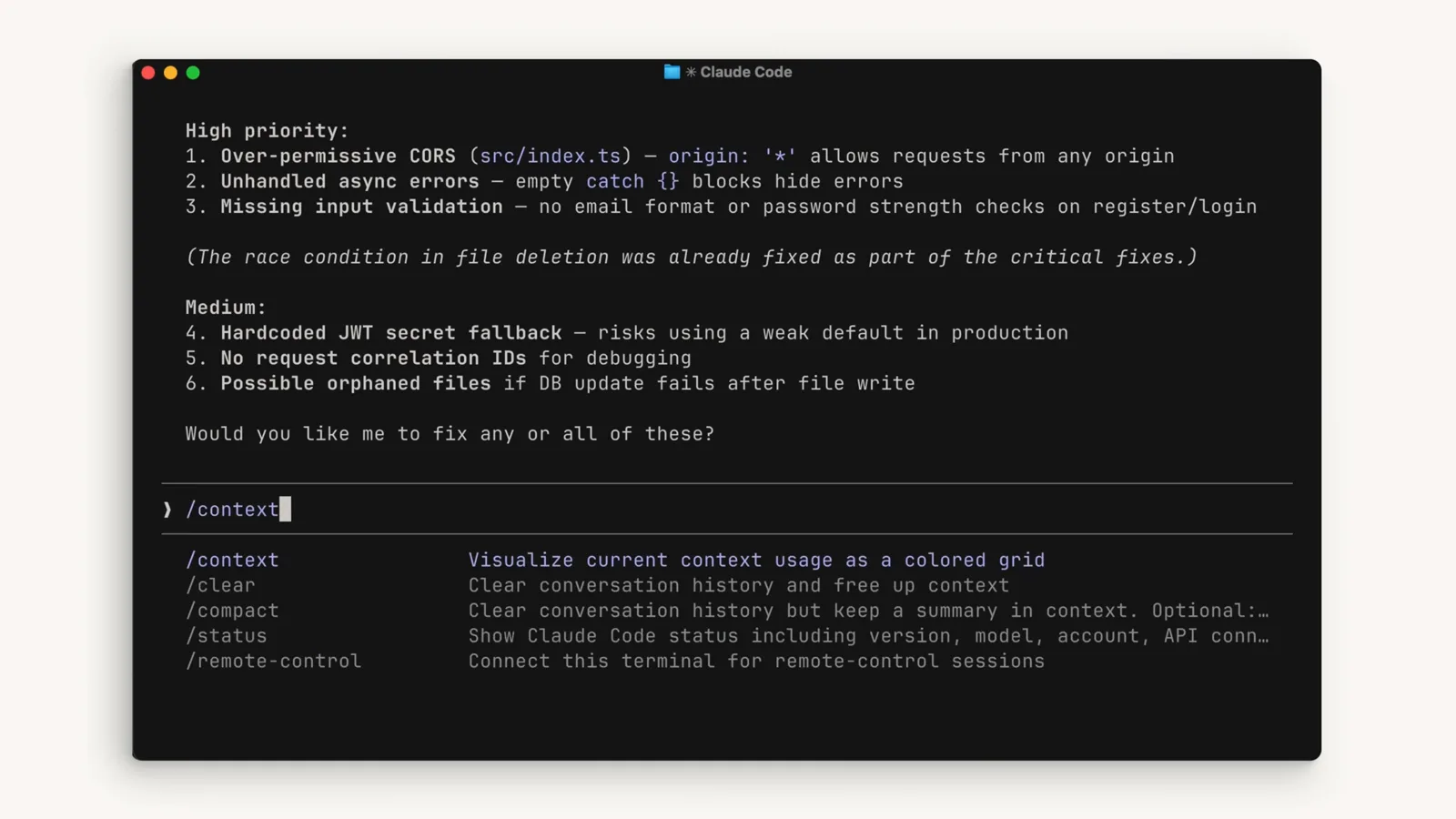 Claude Code slash command menu showing /clear described as clear conversation history and free up context while /compact keeps a summary in context