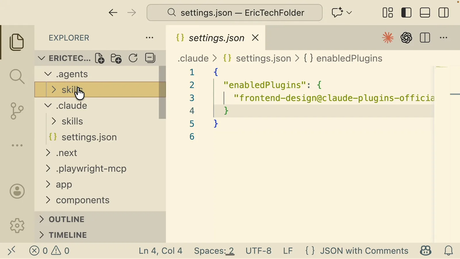 Project .claude/settings.json open in Visual Studio Code showing the enabledPlugins key with the frontend-design Claude plugin
