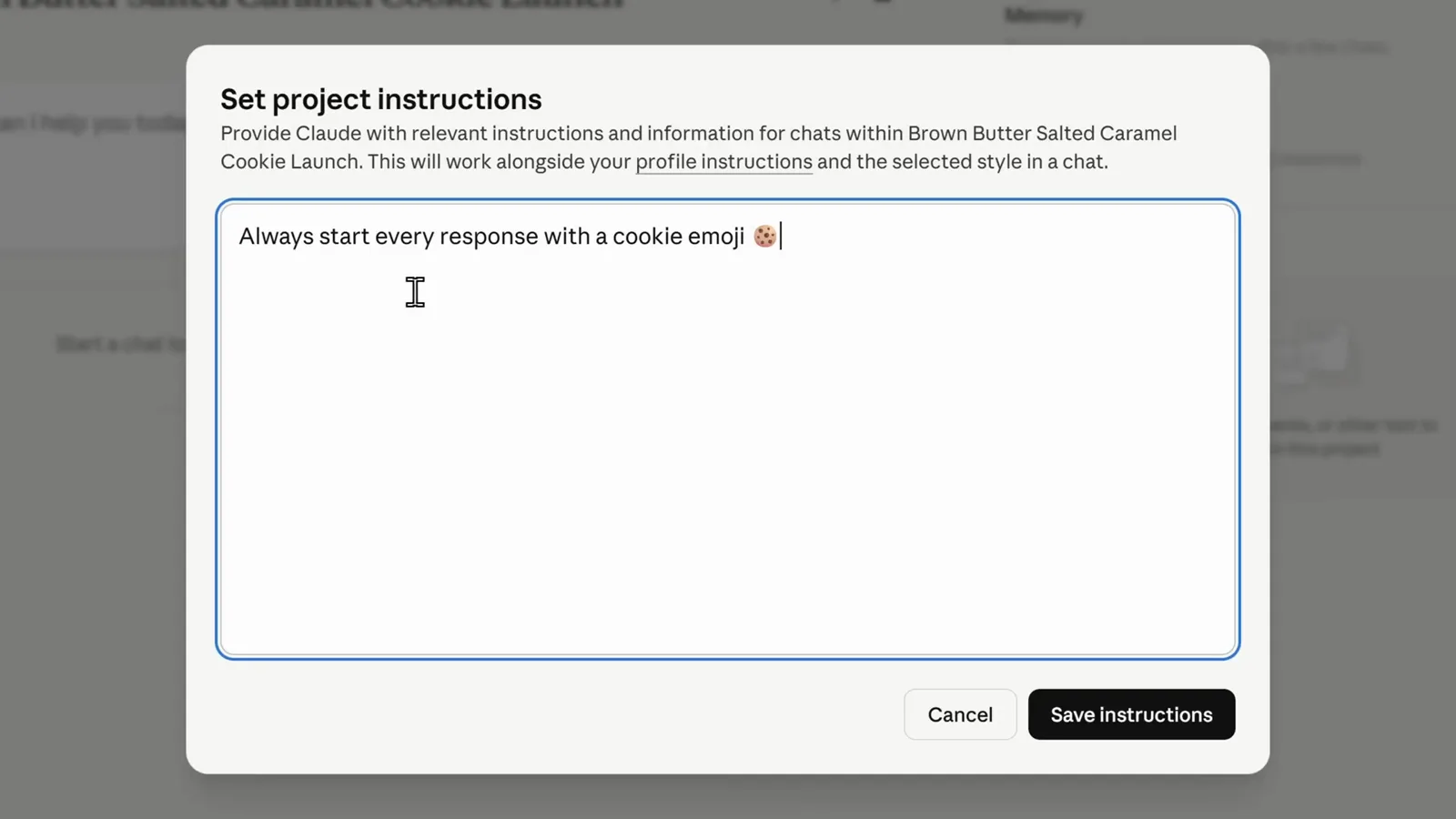 Set project instructions modal in Claude with Always start every response with a cookie emoji typed and Cancel and Save instructions buttons at the bottom