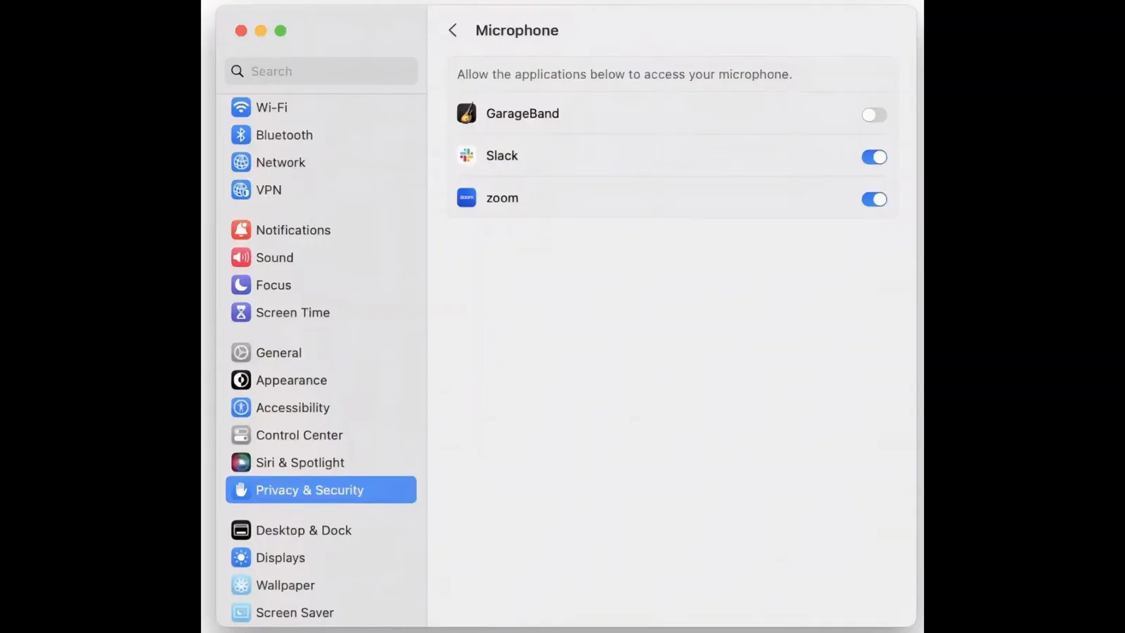 macOS System Settings Privacy and Security Microphone pane listing GarageBand switched off with Slack and zoom switched on, where the ChatGPT desktop app gets permission to hear you