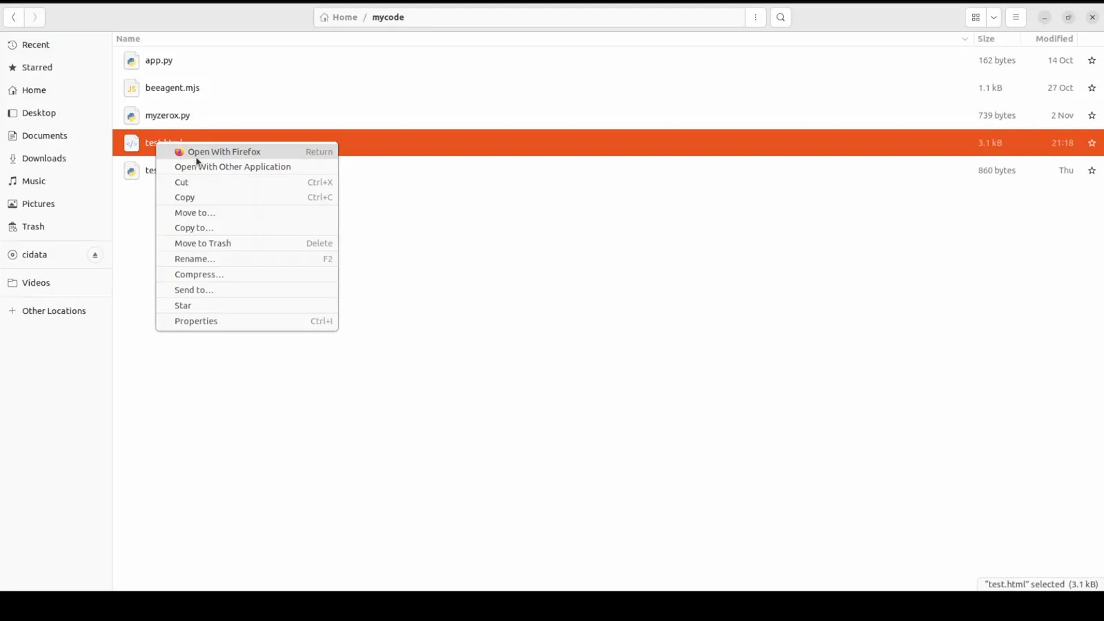 Ubuntu Files window in the mycode folder with a 3.1 kB test.html selected and the right-click menu open on Open With Firefox Ubuntu Files window in the mycode folder with a 3.1 kB test.html selected and the right-click menu open on Open With Firefox