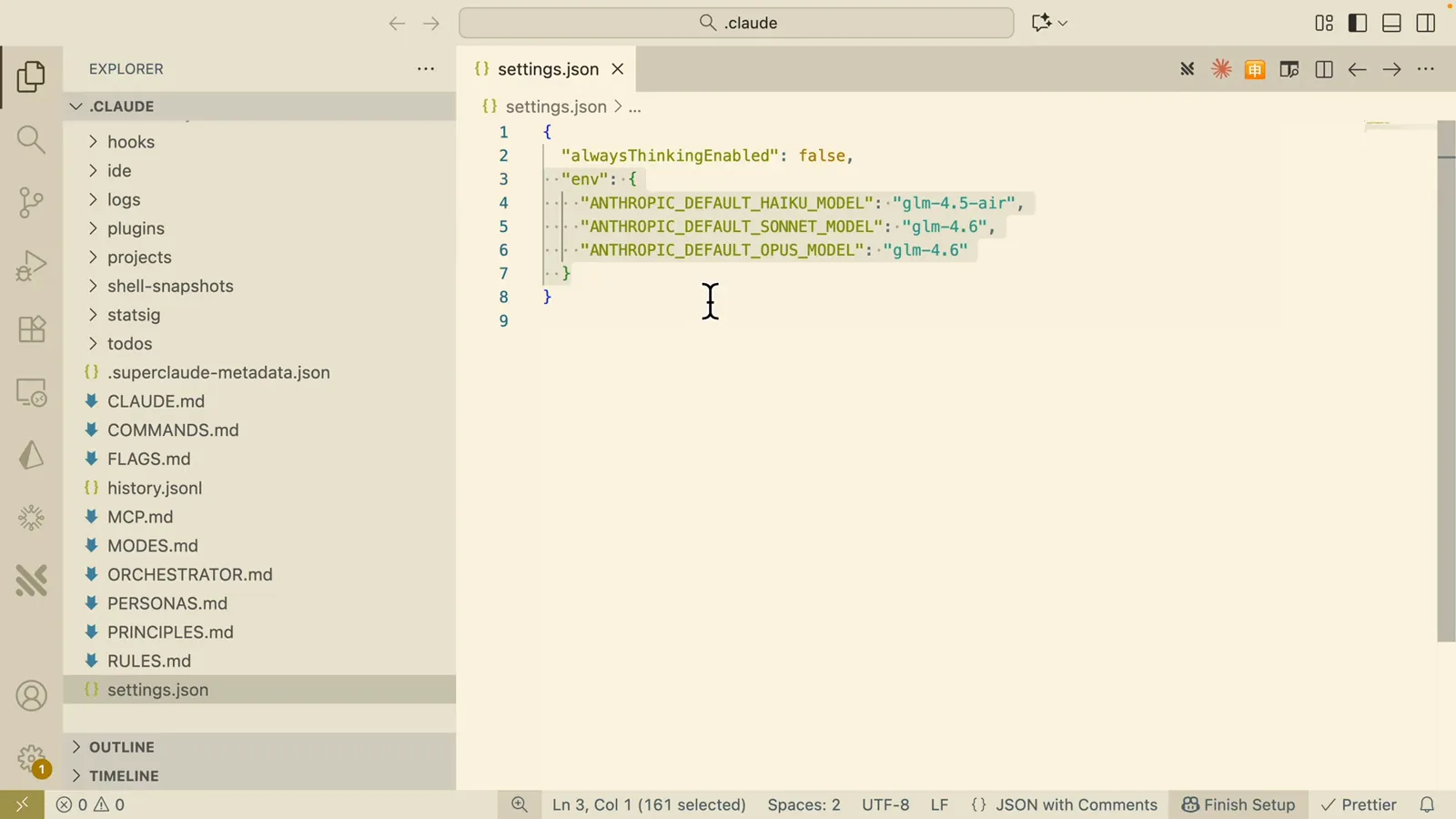 VS Code editing the settings.json model-mapping env vars that point Claude Code Opus, Sonnet, and Haiku slots at GLM model IDs